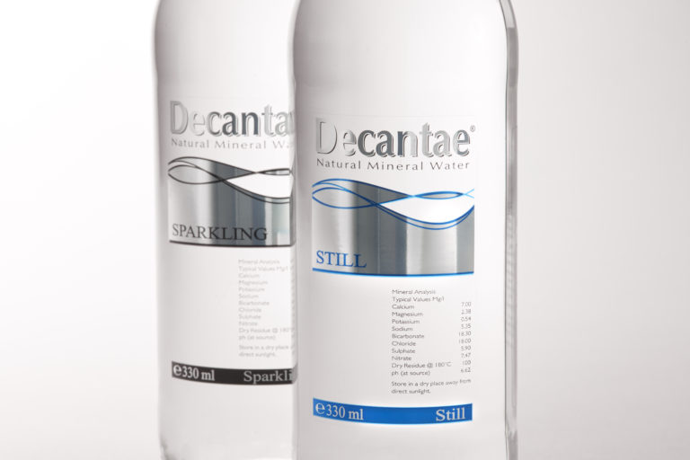 Mineral water labels printed on clear on clear stock with gloss silver cold foil