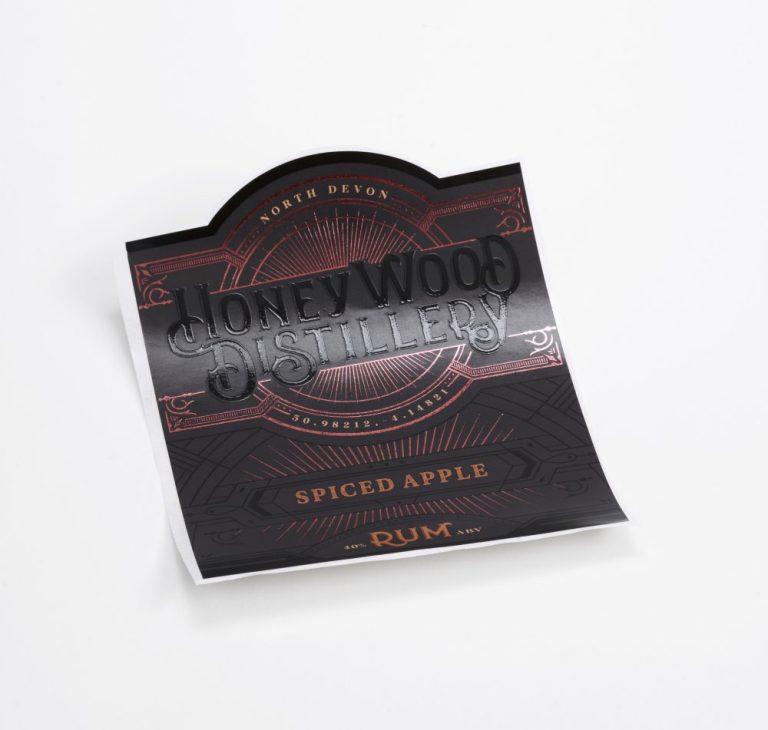 Spiced rum label with digital high build varnish and copper foiling