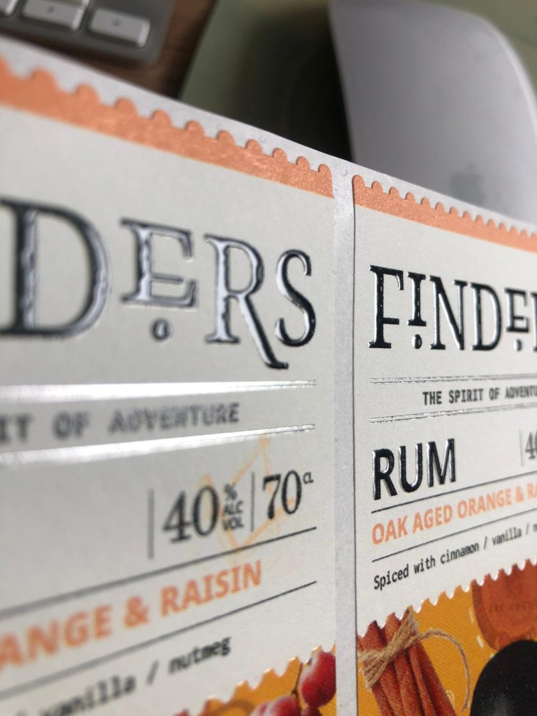 Spirits label with gloss black embossed foil