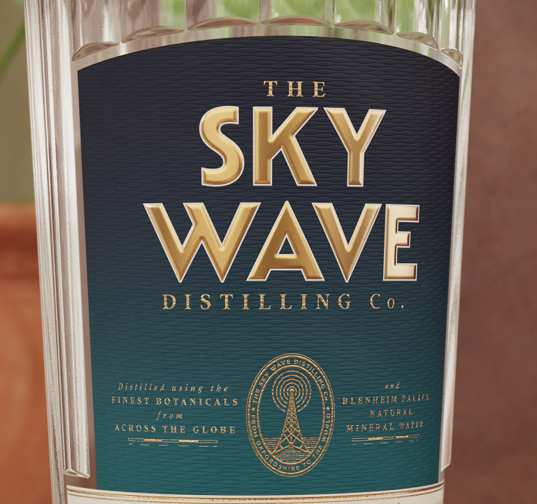 Gin label with debossing plus embossed gold foil